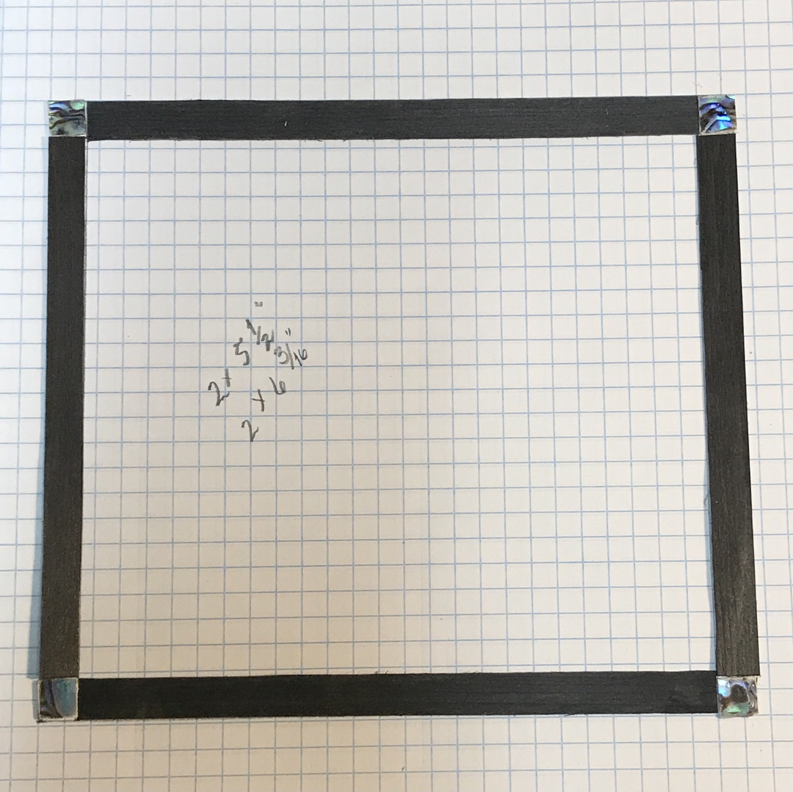 The frame to separate the triangles from the central design.